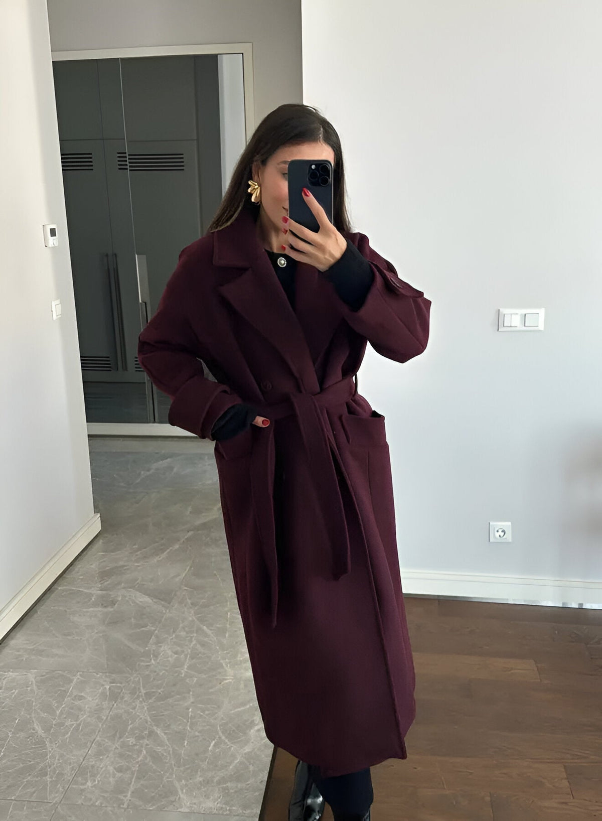 Lang vinterfrakke med bælte til damer