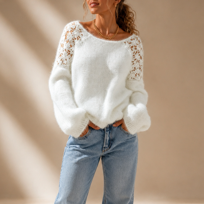 Elegant strikbluse med blonde-look