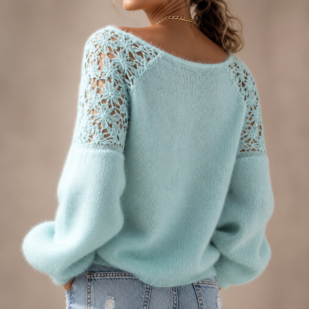 Elegant strikbluse med blonde-look