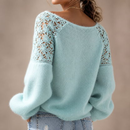 Elegant strikbluse med blonde-look