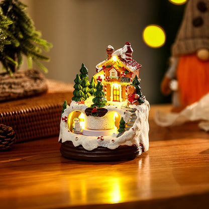 Julelandsby med lys og bevægelige figurer