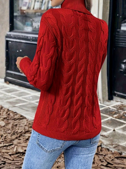 Kabelstrikket rullekravetrøje til damer med afslappet pasform og lange ærmer