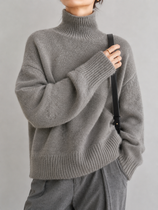 Kashmirrullekravestrik til damer med ribbede ærmekanter – oversized design i blød strik