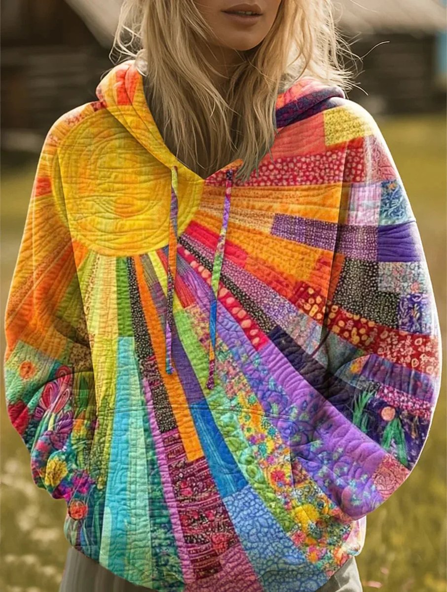 Løstsiddende quiltet patchwork-hættetrøje til damer med solprint