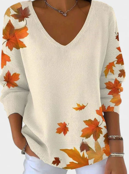Langærmet sweater til damer med V-udskæring og ahornbladprint