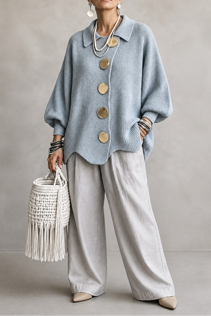 Oversized cardigan med knapper og bølgekant