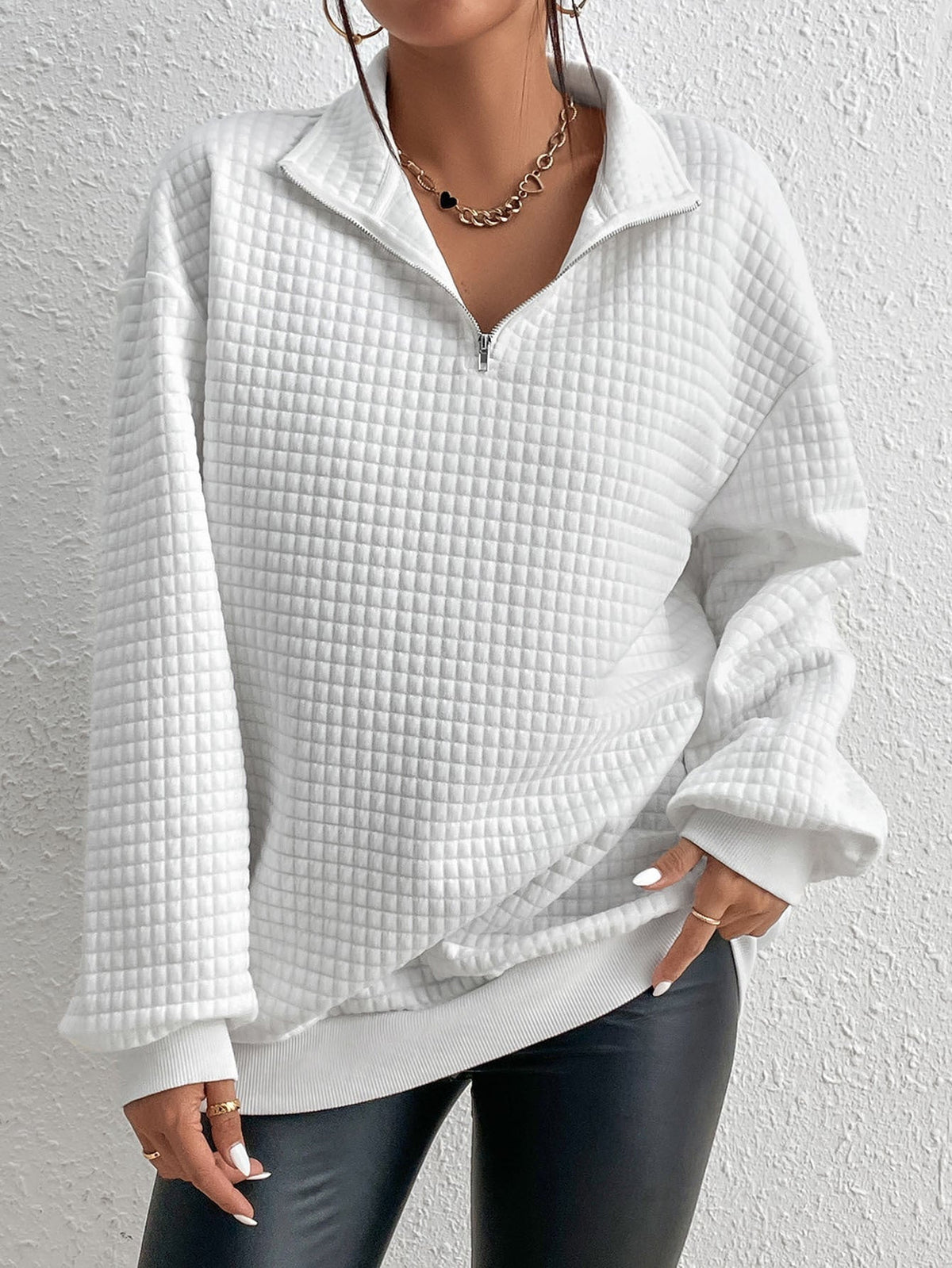 Quiltet half-zip-sweatshirt til damer i afslappet pasform