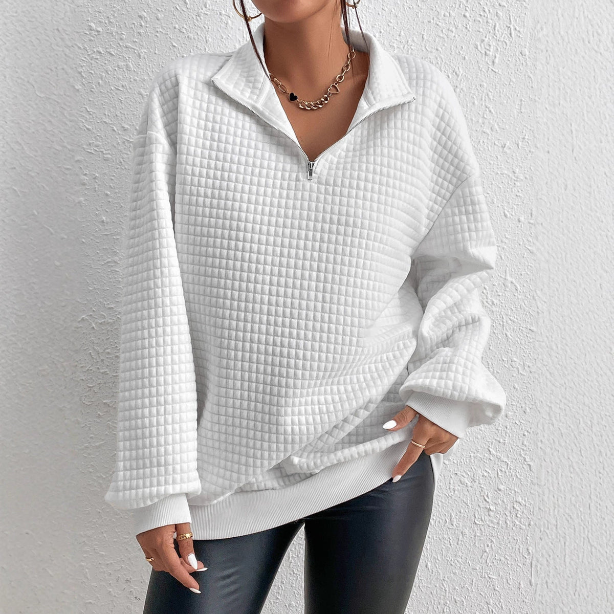 Quiltet half-zip-sweatshirt til damer i afslappet pasform