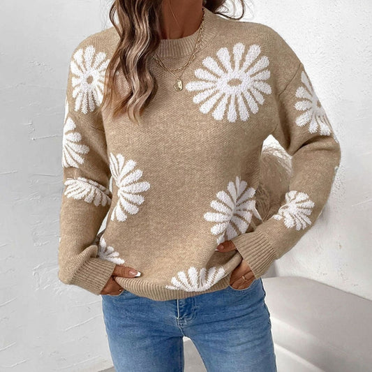 Rundhalset intarsiastrikket dametrøje med blomstermønster og afslappet pasform