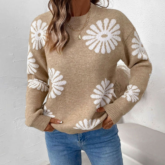 Rundhalset intarsiastrikket dametrøje med blomstermønster og afslappet pasform