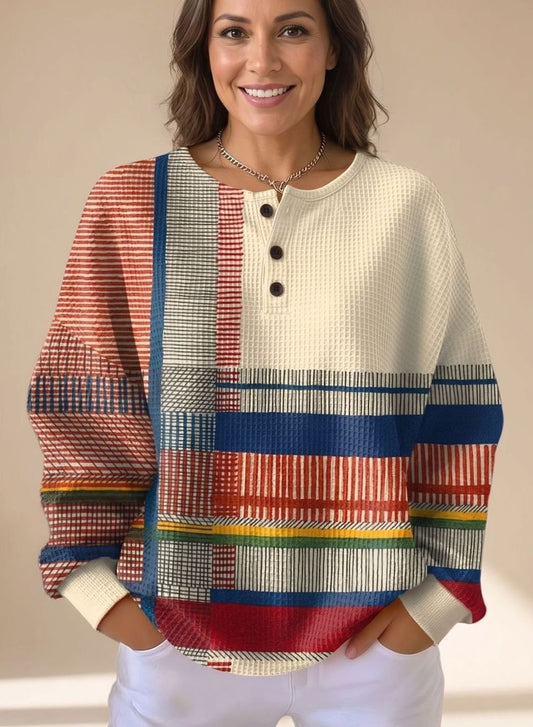 Vaffelstrikket henley-trøje med colorblock og afslappet pasform til damer